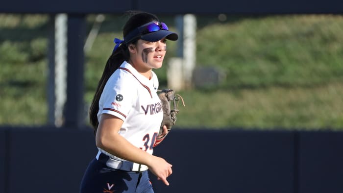 Kelly Ayer runs in the outfield during the Virginia softball game against Longwood at Palmer Park.